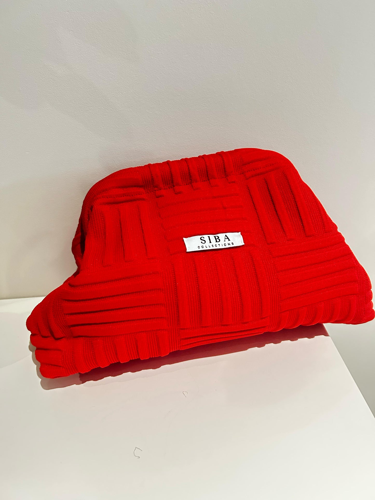 Siba clutch bags