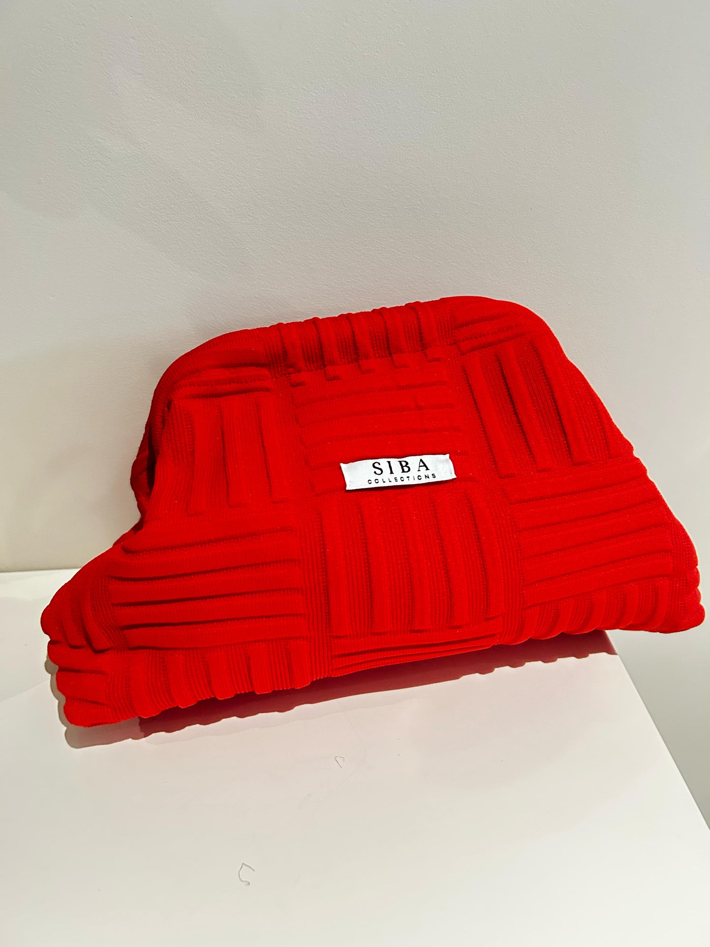Siba clutch bags