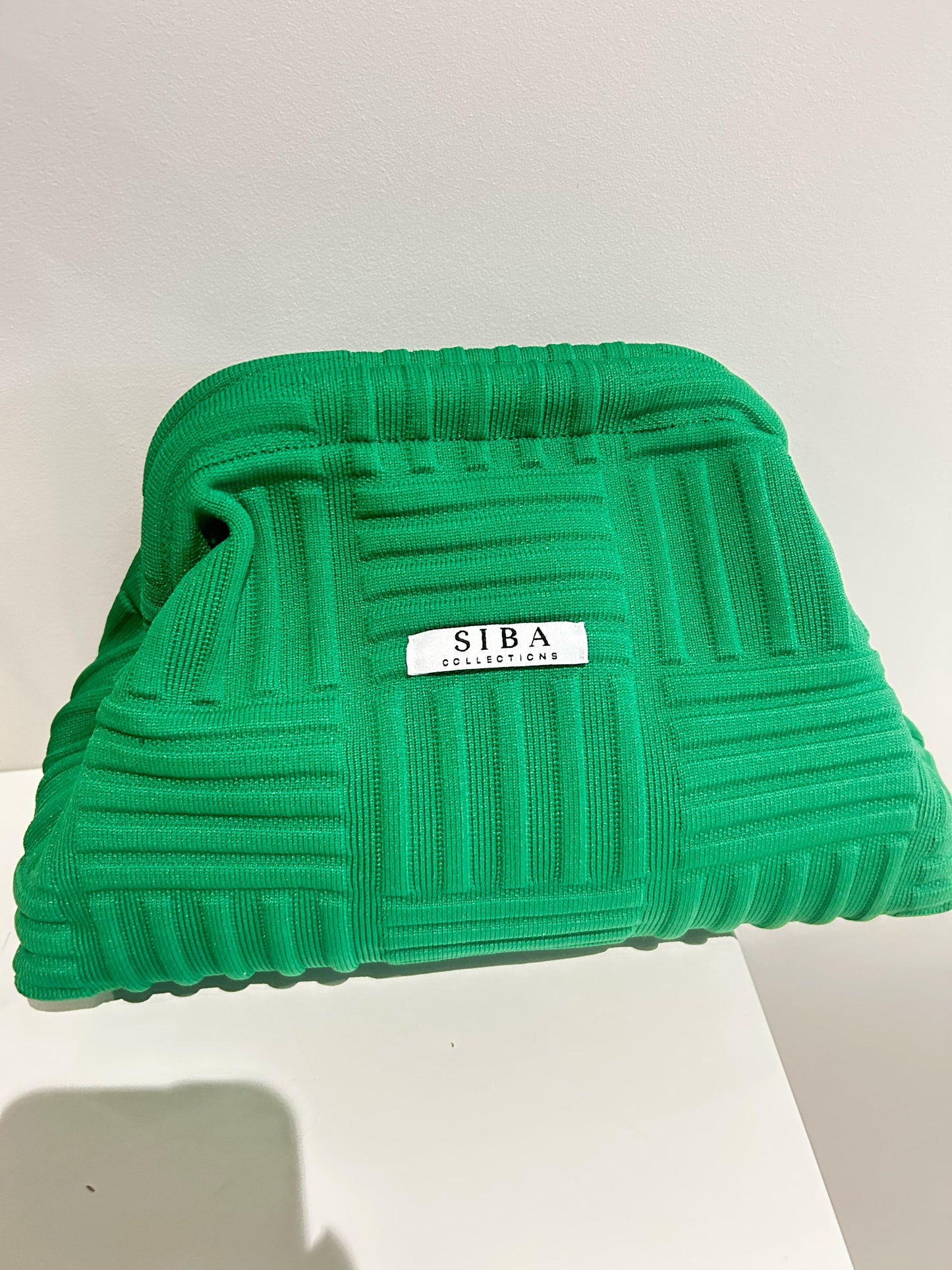 Siba clutch bags