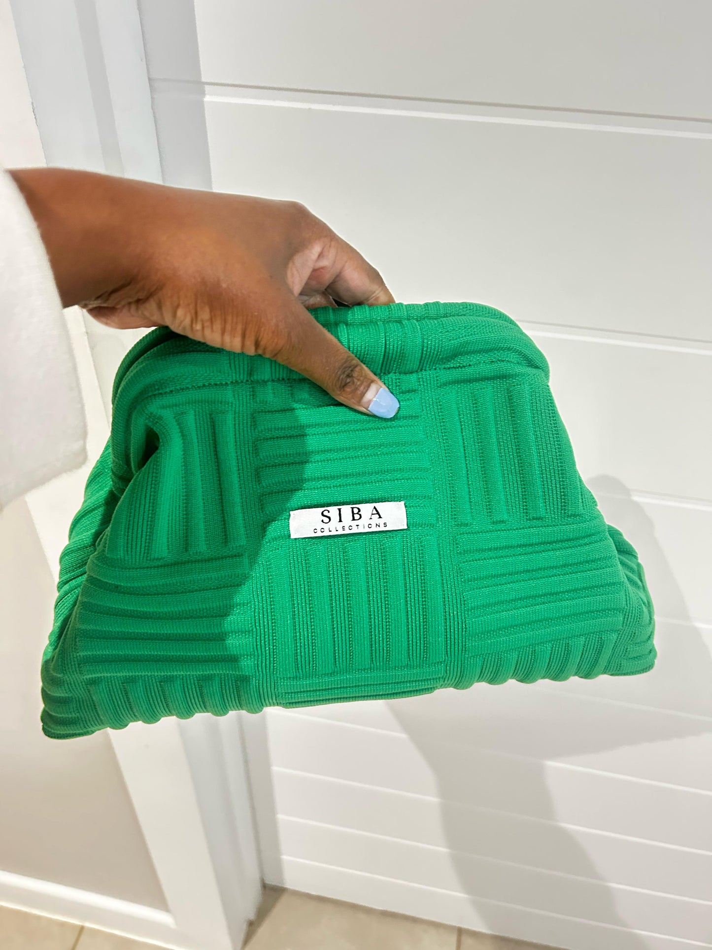 Siba clutch bags